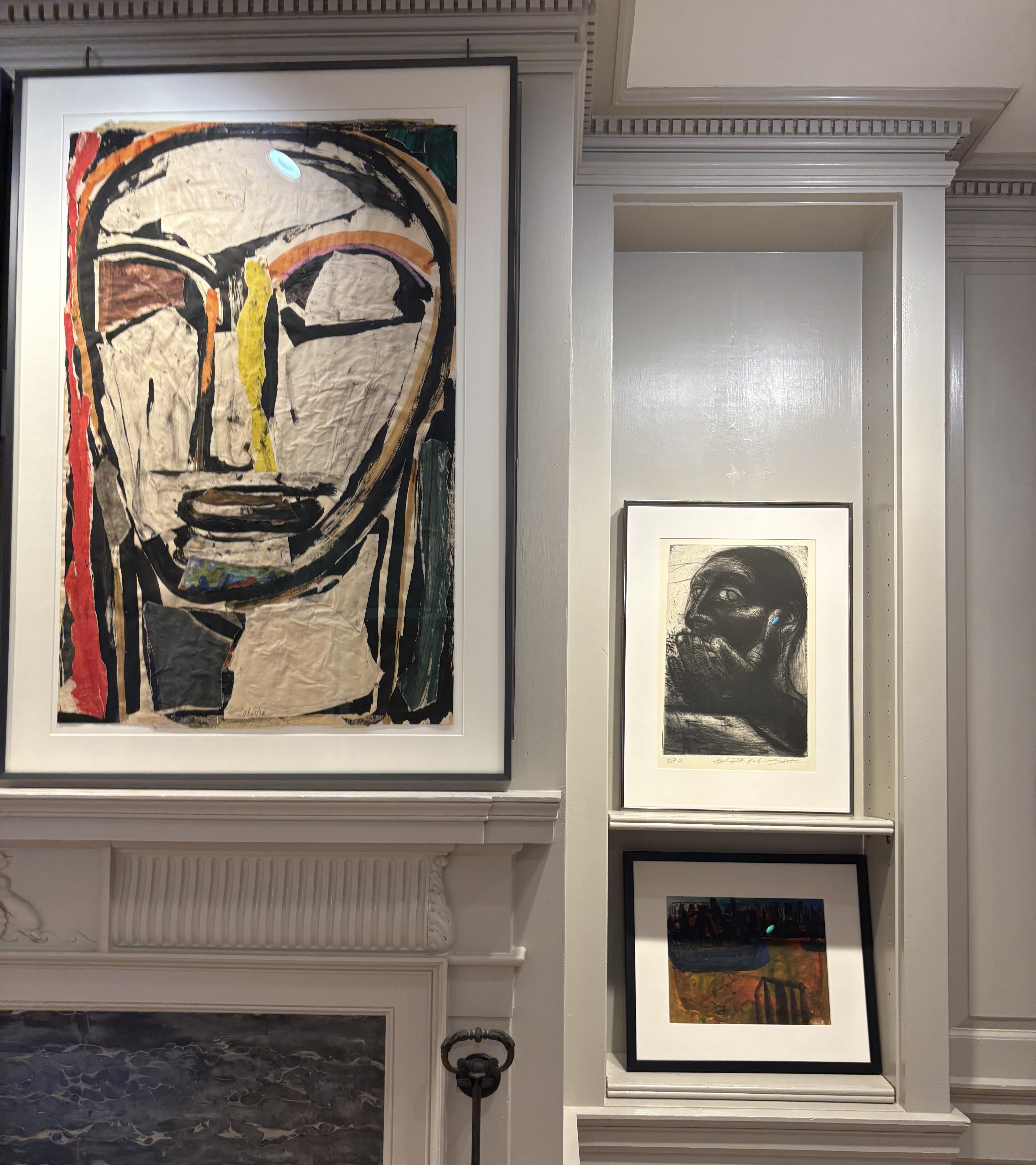 Mixed-scale installation with large head and smaller works, Ann Norton Sculpture Gardens